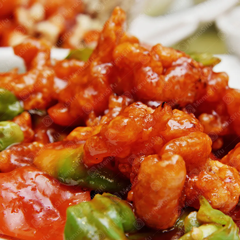 Crispy chicken in sweet and spicy sauce with bell peppers at JS Chen's DimSum & BBQ, a Chinese Restaurant in Plano